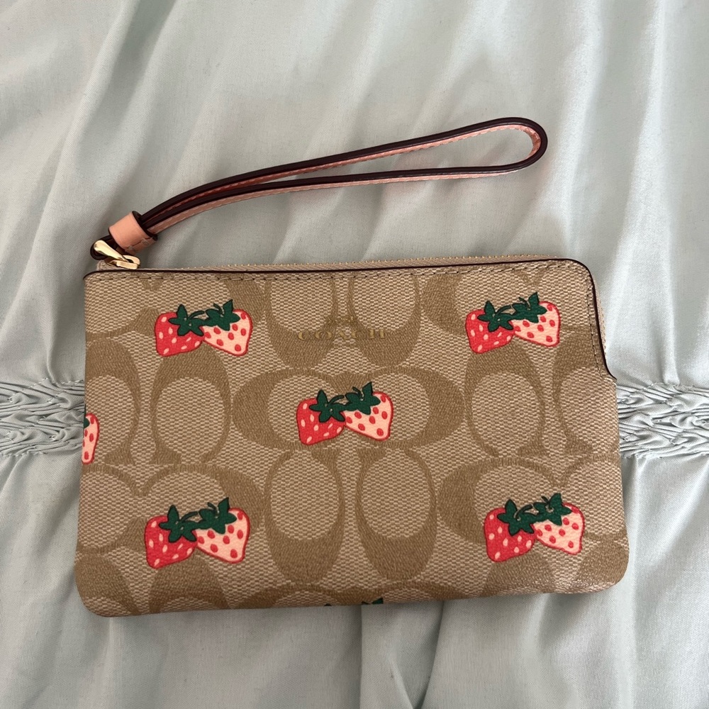Coach strawberry wristlet in good condition
